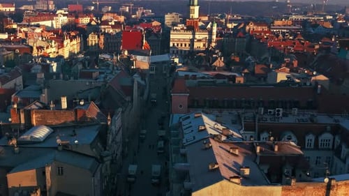 Aerial old town sunrise historic rooftops skyline