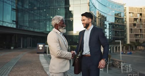 Business people, handshake and meeting in city for partnership, outdoor introduction
