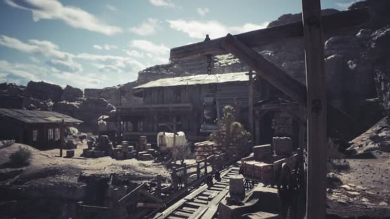 Old Mining Town Under Bright Sky with Wooden Structures and Rocky ...