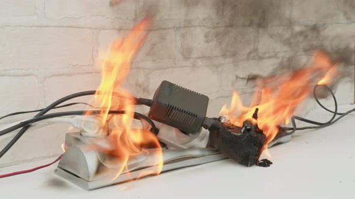 Power Strip Sparks Flames in Electrical Fire, Industrial Stock Footage ...