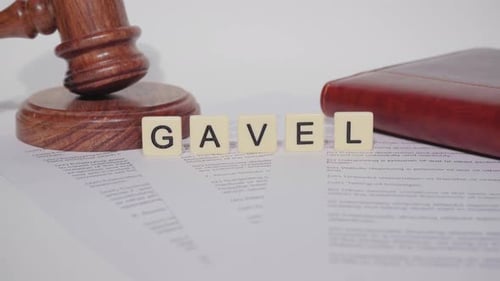 Gavel, Law Book, and Letter Tiles