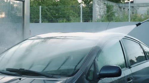 The Car Wash Process That Utilizes a HighPressure Water Spray for Thorough Cleaning