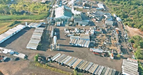 Airborne View of a Chemical Manufacturing Facility and Industrial Zone with Tanks Containing
