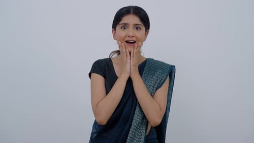 Woman Reacting to Good News Wearing Saree