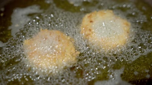 Close Up Frying Breaded Food Hot Oil Frying Pan Cooking Kitchen Action