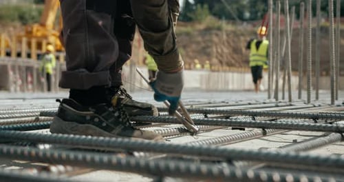 A Worker Weaves Reinforcement