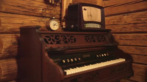 vintage clock, radio and pump organ