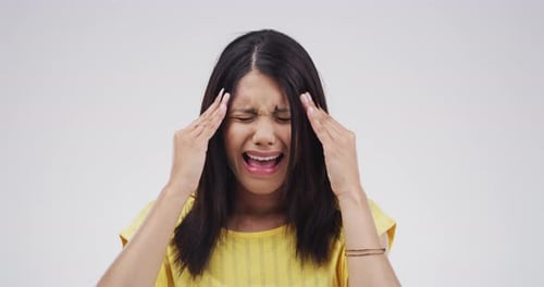 Distressed Woman Experiencing Headache or Pain
