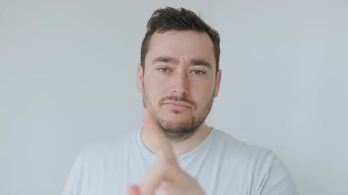 Man Indicating "No" with Finger