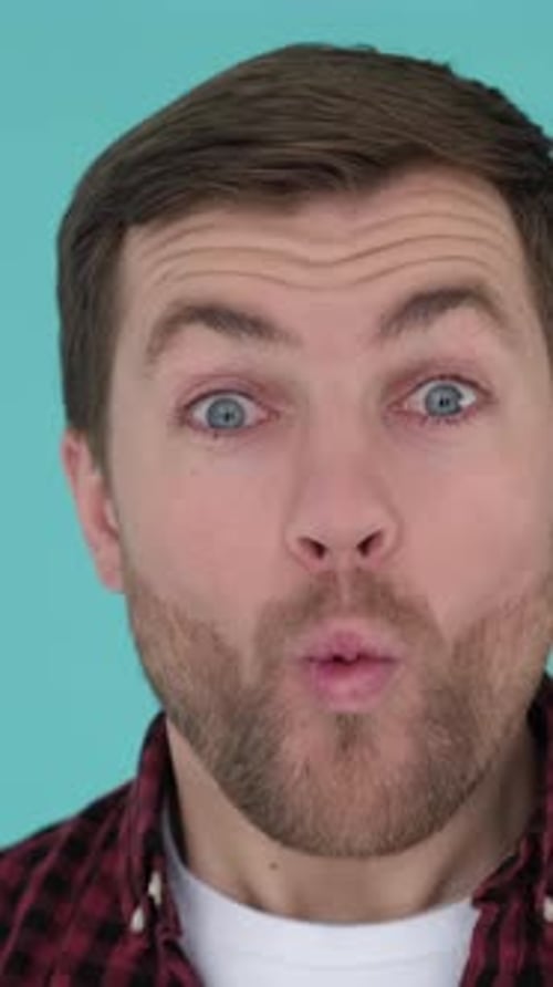 Man Reacting with Surprise in Close-Up Portrait