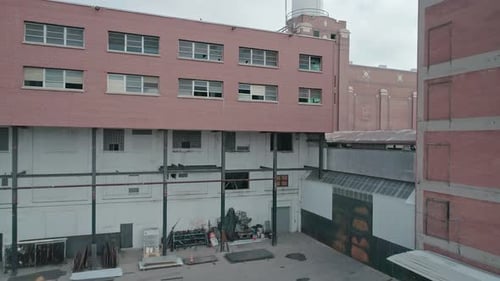 Aerial view of a red industrial building in Denver