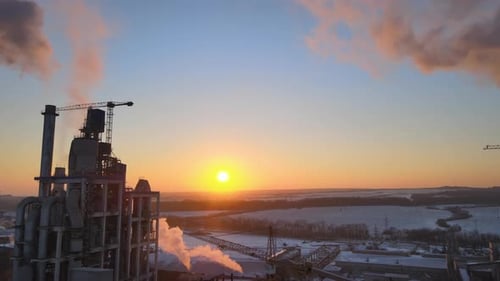 Aerial View of Cement Factory with High Concrete Plant Structure and Tower Crane at Industrial