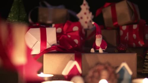 Festive Christmas Gifts and Candles Still Life