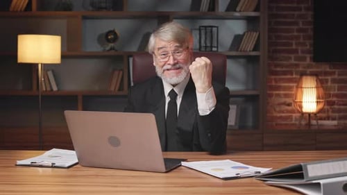 Man Celebrates Achievement in Office