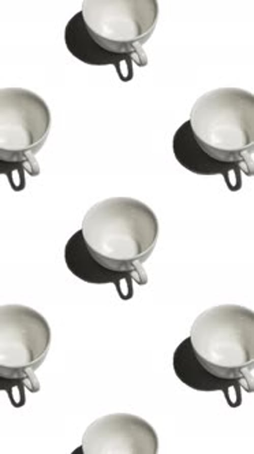 Seamless Pattern of White Cups with Strong Shadows on a White Background