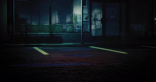 Mysterious Urban Nighttime Setting with Illuminated Parking Lot