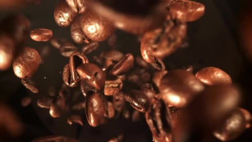 Super Slow Motion Roasted Coffee Beans Filmed on a Highspeed Camera at 1000 Fps