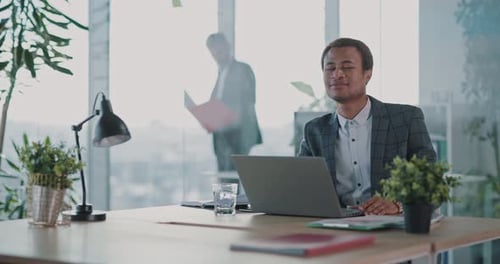 African American Recruiting Manager Hiring People in Office Talking with Young Female Candidate