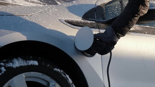 Closing Electric Car Charging Port in Winter