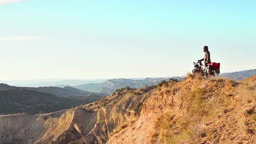 Bicycle Touring Traveler Stand In Vashlovani, Georgia