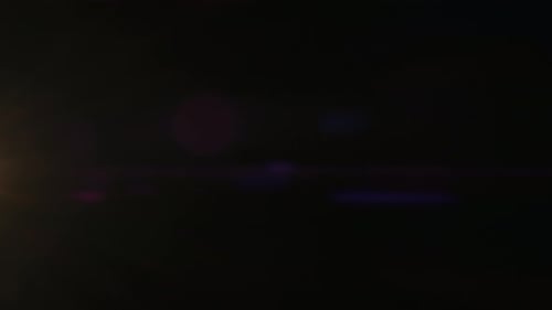 Abstract Overlay with Small Light Disappearing Transition Lens Flare Flashes Effects on Dark