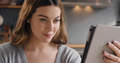 Coffee, young woman and tablet for online reading, connection and search internet at home