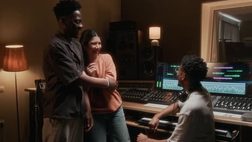 Music Band Dancing in Recording Studio