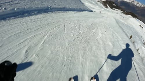 FirstPerson View Of A Skier Sliding Down on Ski Slope at A Resort In Italy