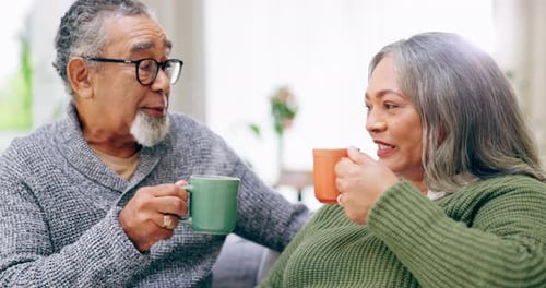 Loving Couple Enjoying Their Coffee Indoors