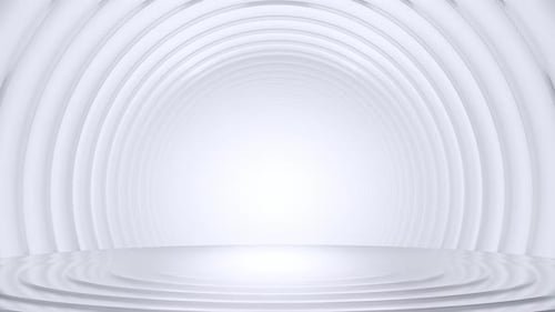 Minimal white circular stage with arch tunnel