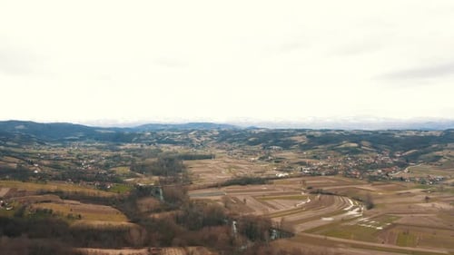 Autumn landscape of the village and arable land and river, Drone 4K colored