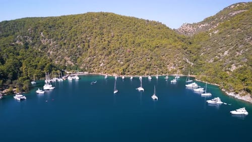 Aerial view of a beautiful bay with turquoise water and boats, Fethiye, Turkey.