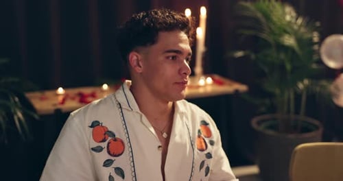 Dating, breath and waiting with man in restaurant at night for anniversary