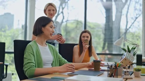 Friendly Company Colleagues Enjoying Break at Office Close Up Coworkers Talking