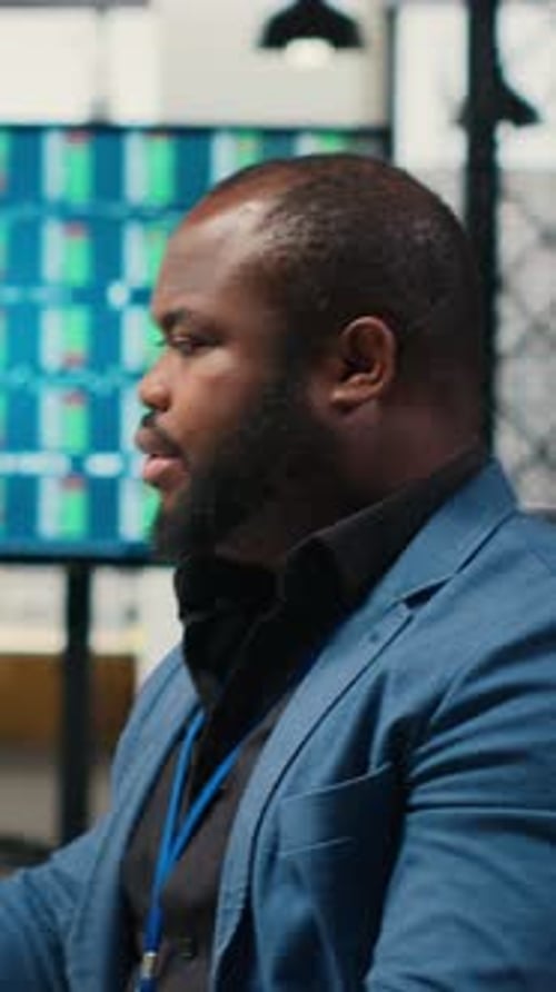 Vertical Video African American Consultant Engaged in Planning and Analysis
