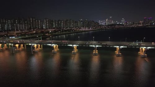 Panoramic Aerial View of Seoul Han River at Night Glimmers Under City Lights Han River at Night Vein