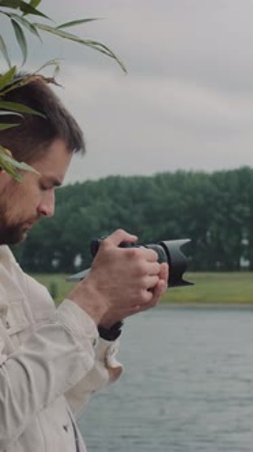 Portrait of videographer at the river
