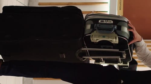 Vertical Video Cheerful Professional Hotel Bellboy