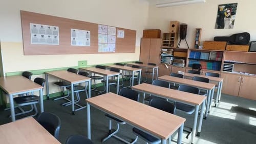 Empty Classroom with Desks Ready for Students