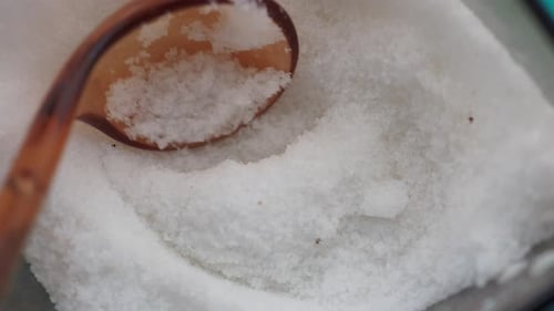 Top View of Spoon Pick Salt in a Bowl