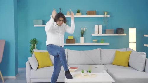 Funny conductor. Funny artist man making music at home.