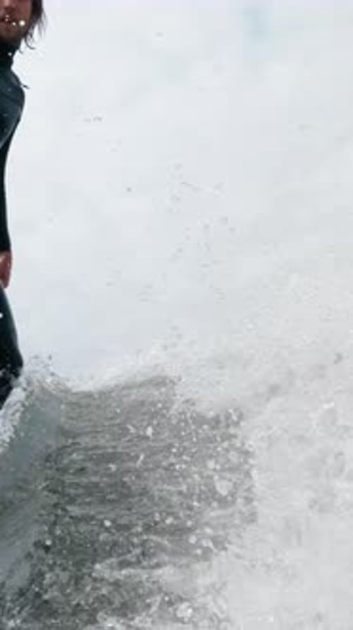 A Dynamic Surfing Experience Captured in Two Frames The Thrill of Riding Waves on a Surfboard