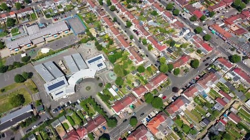 Aerial drone footage of the the large suburb of Wembley in north-west London in the UK