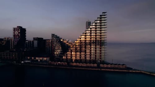 Aerial View Of Harbor Cityscape At Dusk