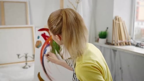 Professional Artist Girl Drawing Abstract Picture in Workshop Bright Colors Talented Woman Painter
