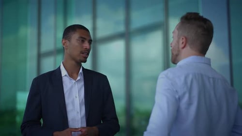 A Meeting on Professional Communication Teamwork and Collaboration Between Two Men