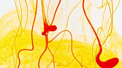 Color Yellow Paint Drops in Water Abstract Color Mix Drop of Ink Color Mix Paint Falling on Water