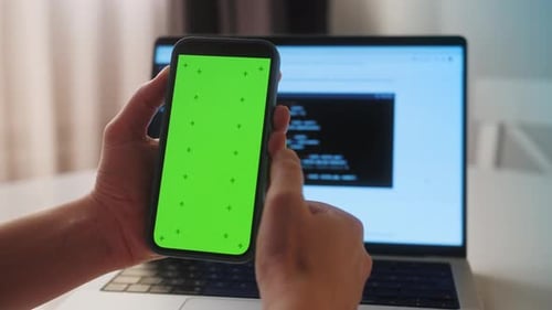 Phone with Chroma Key Green Screen with Man Working with Chatbot AI Online Connecting with AI and