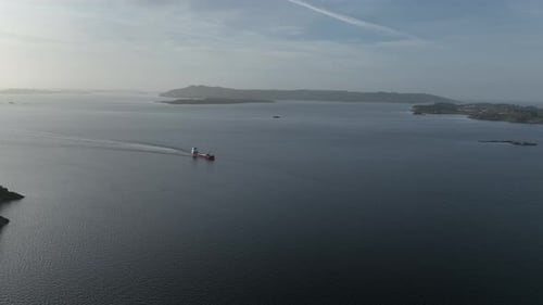 Cargo Ship Sailing on Water From Aerial View