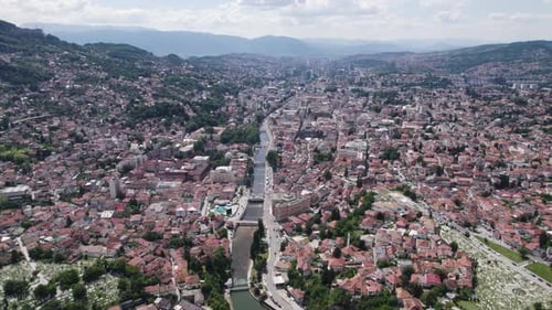 Aerial: dense cityscape with river, Sarajevo, Bosnia and Herzegovina